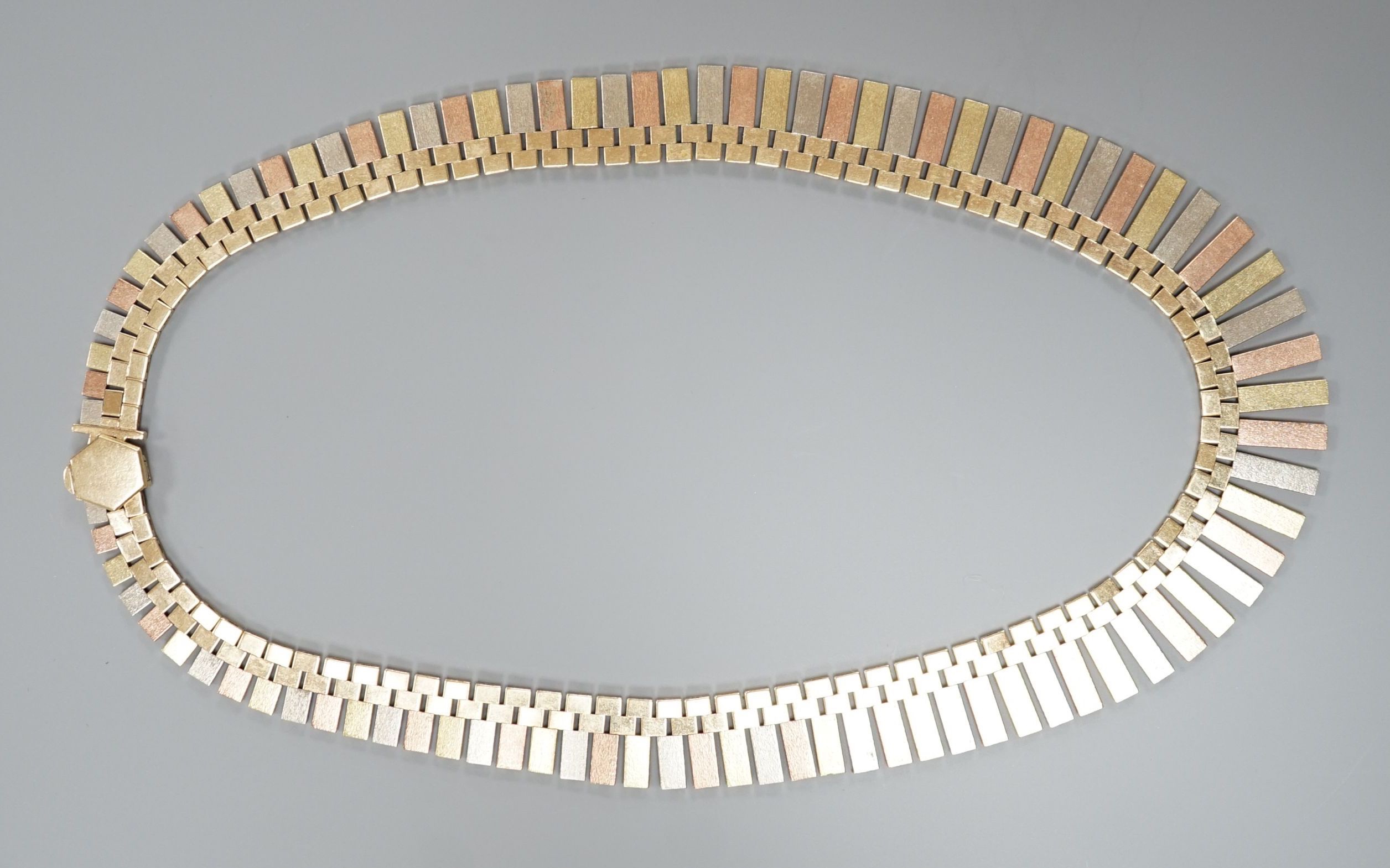 A modern three colour 9ct gold fringe necklace, 40cm, 46.7 grams.